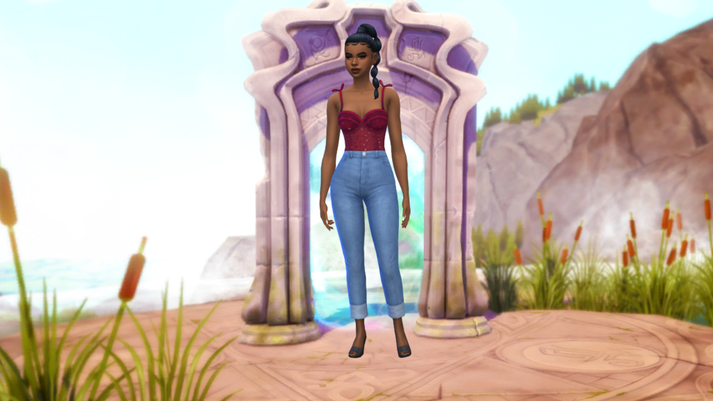 Un sim con pantalones vaqueros de talle alto azules y un corsé rojo con el pelo recogido en una trenza. Este sim está de pie en el Reino de la Magia de Los Sims 4 justo frente a un portal mágico como fondo de pantalla de CAS.