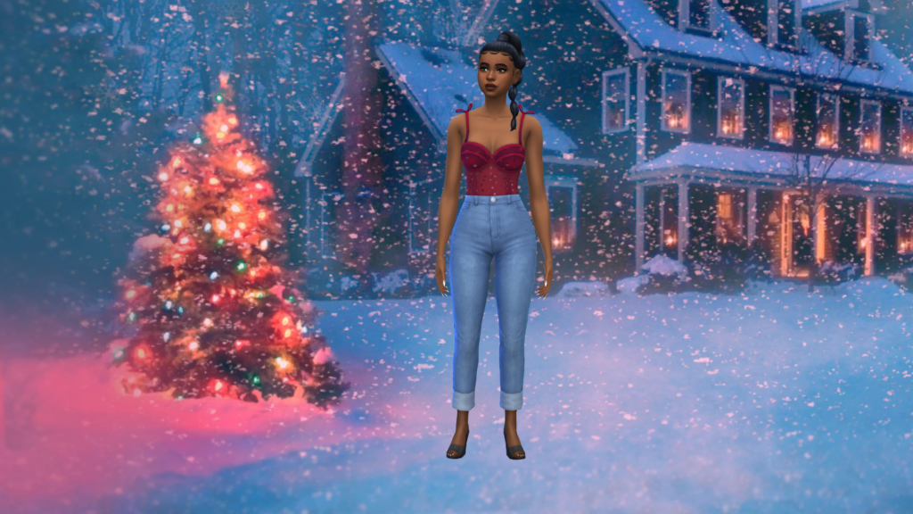 Una sim con pantalones vaqueros azules de talle alto y un body corset rojo con el cabello recogido en una trenza. Esta sim está de pie frente a una casa donde hay un árbol de Navidad y mucha nieve.