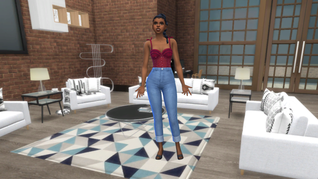 Un sim con pantalones vaqueros de talle alto y un body corsé rojo con el pelo recogido en una trenza. Este sim está de pie sobre una alfombra geométrica en una sala de estar con paredes de ladrillo y sofás blancos.