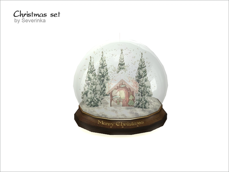 Un fondo blanco con un globo de nieve de CC de Sims 4 en él. Hay cuatro árboles cubiertos de nieve y una pequeña casa de pan de jengibre.
