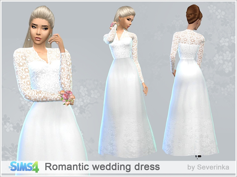 Un vestido de novia con una falda de encaje y un conjunto de mangas largas que cubren un corsé