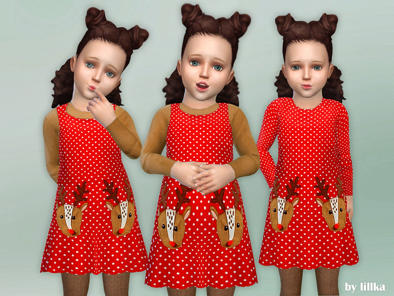 El mismo niño pequeño de pelo castaño tres veces mostrando variaciones del mismo vestido rojo de lunares navideño.