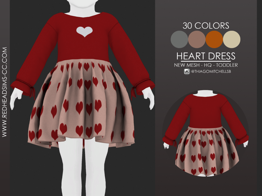 un lindo vestido para niños pequeños con corazones rojos en la falda