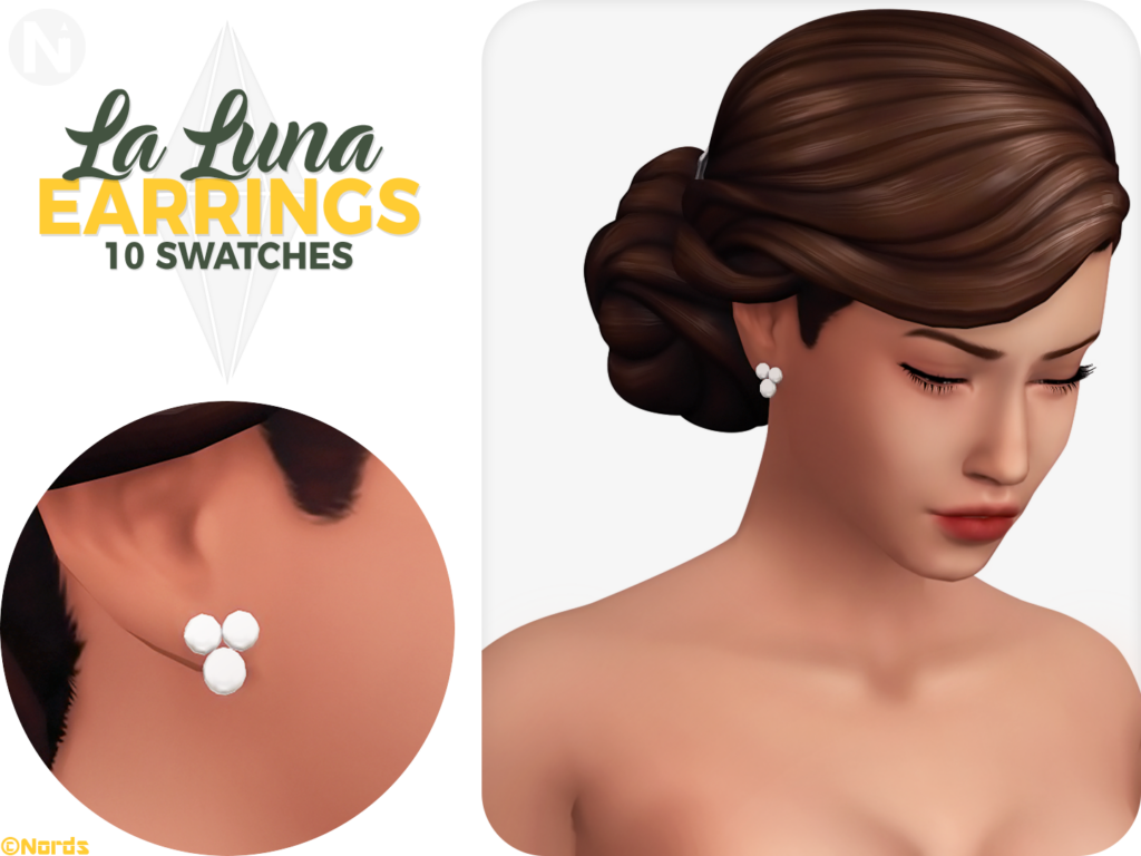 Una sim con el cabello recogido en un elegante moño hacia atrás, que lleva puestos unos pendientes blancos que son tres puntos blancos en forma de triángulo.