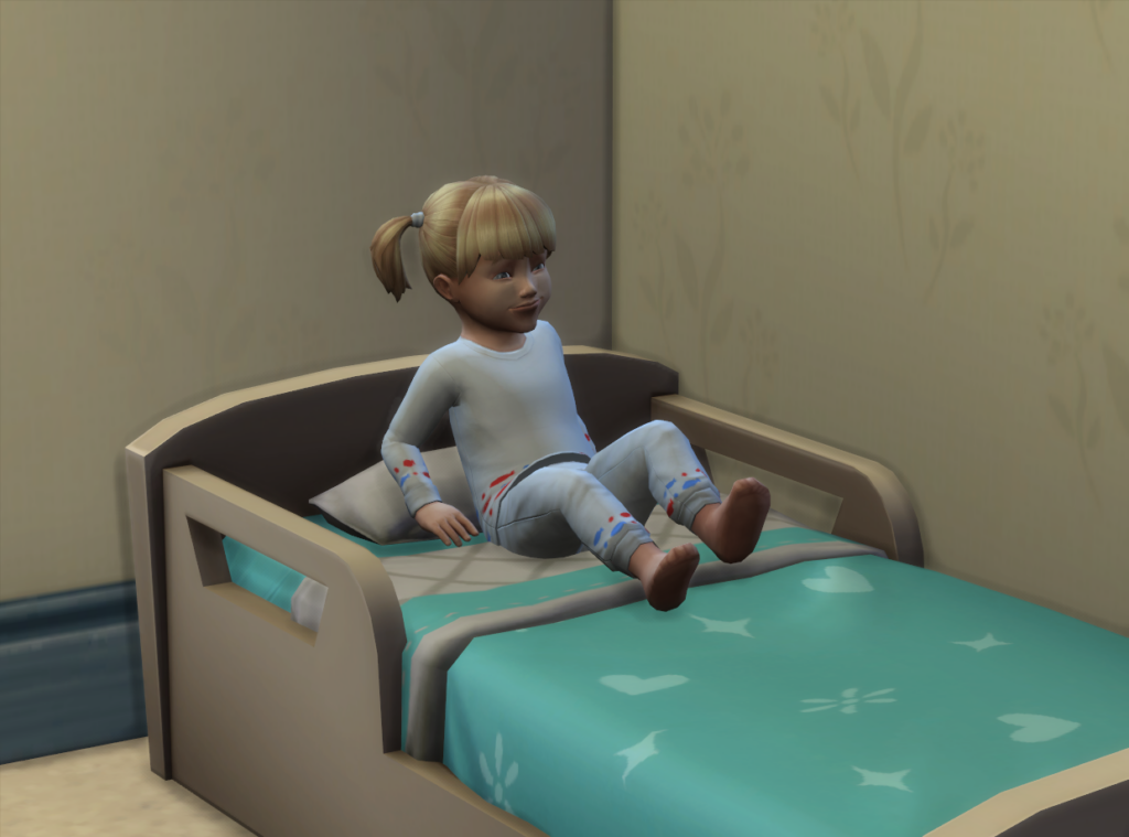 niño pequeño metiéndose en una cama para niños pequeños
