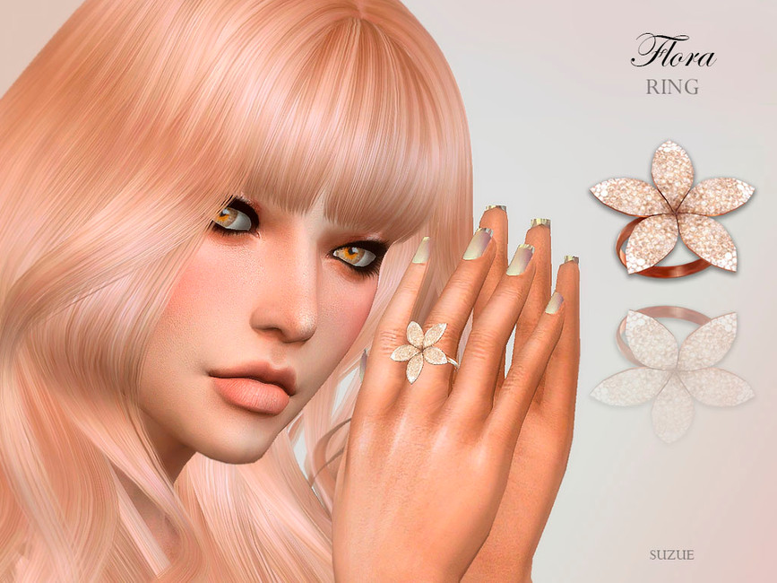 Un Sim con ojos marrones claros y delineador oscuro que tiene cabello de oro rosa. Lleva un anillo en forma de flor.
