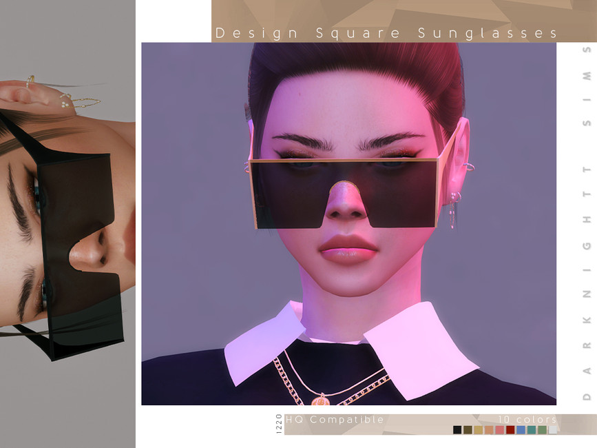 Un Sim que lleva puesto un suéter negro sobre una camisa blanca, lleva el cabello recogido en un moño y lleva puestas unas gafas cuadradas negras y doradas.