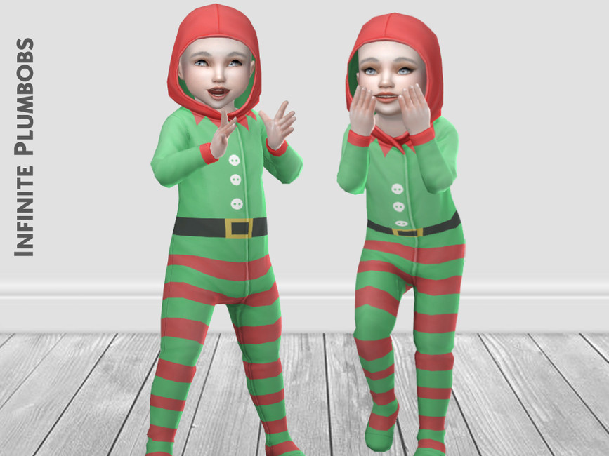 Dos niños pequeños en Los Sims 4 que llevan un pijama mono de Navidad donde tienen la cabeza cubierta y parecen elfos.