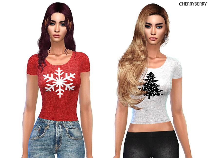Dos sims vistiendo camisetas festivas de Navidad, una con un copo de nieve y otra con un árbol de Navidad