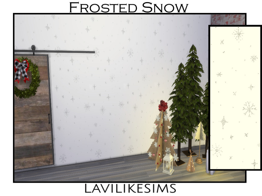 Una habitación con decoraciones navideñas y una puerta de granero de madera. Las paredes tienen un papel tapiz de copos de nieve.